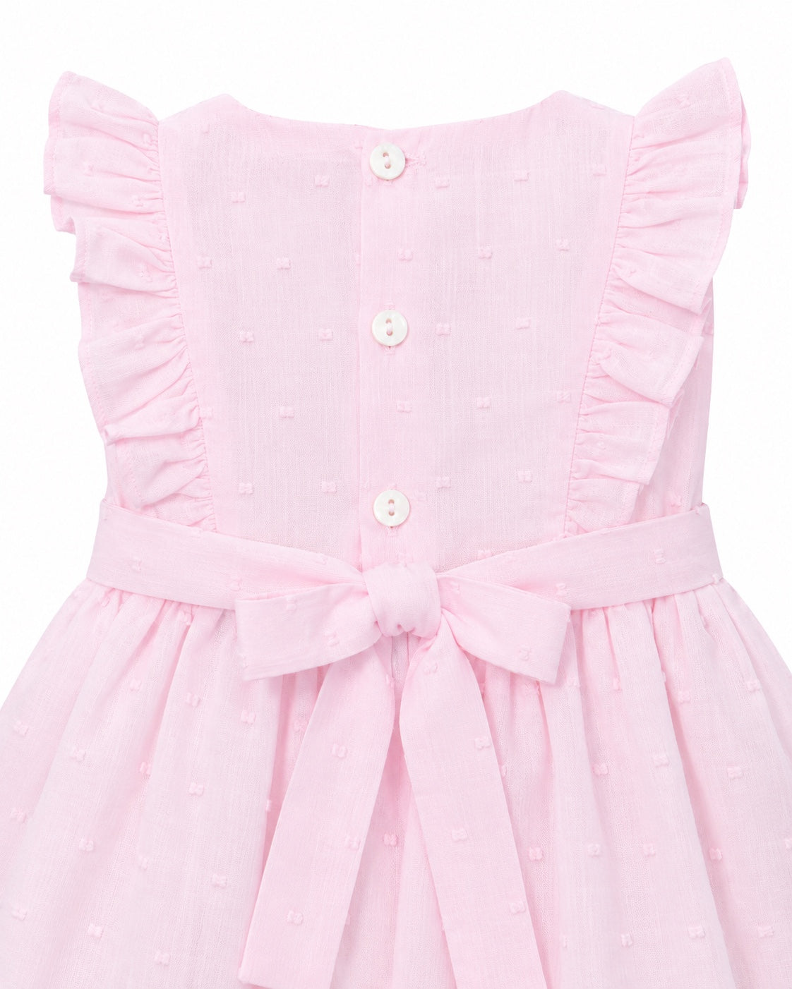 Carriage Boutique baby girl pink Swiss dot dress with ruffled sleeves, back button closure, and a decorative waist bow
