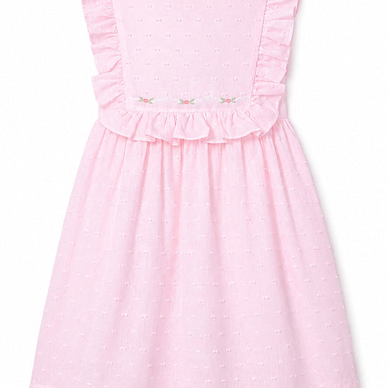 Carriage Boutique pink toddler dress with Swiss dot fabric, ruffled sleeves, and delicate floral embroidery detail.
