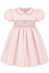 Carriage Boutique pink taffeta toddler girl dress with hand smocked bodice, peter pan collar, and puff sleeves.