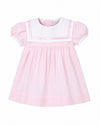 Carriage Boutique pink and white short sleeve toddler dress with a classic sailor collar and pleated skirt detail.
