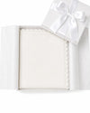 Carriage Boutique off-white quilted baby christening blanket with delicate lace trim inside a white gift box.