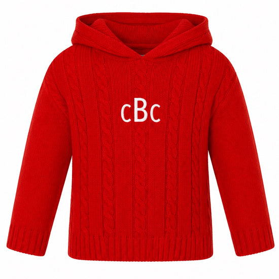 Carriage Boutique red cable knit baby sweater with a hood and white monogram embroidery on the chest