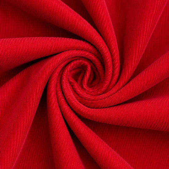 Carriage Boutique red corduroy fabric with a soft texture and fine ribbed detail for a toddler holiday dress