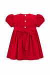 Carriage Boutique red corduroy toddler girl dress with back button closure and a large bow tie at the waist.