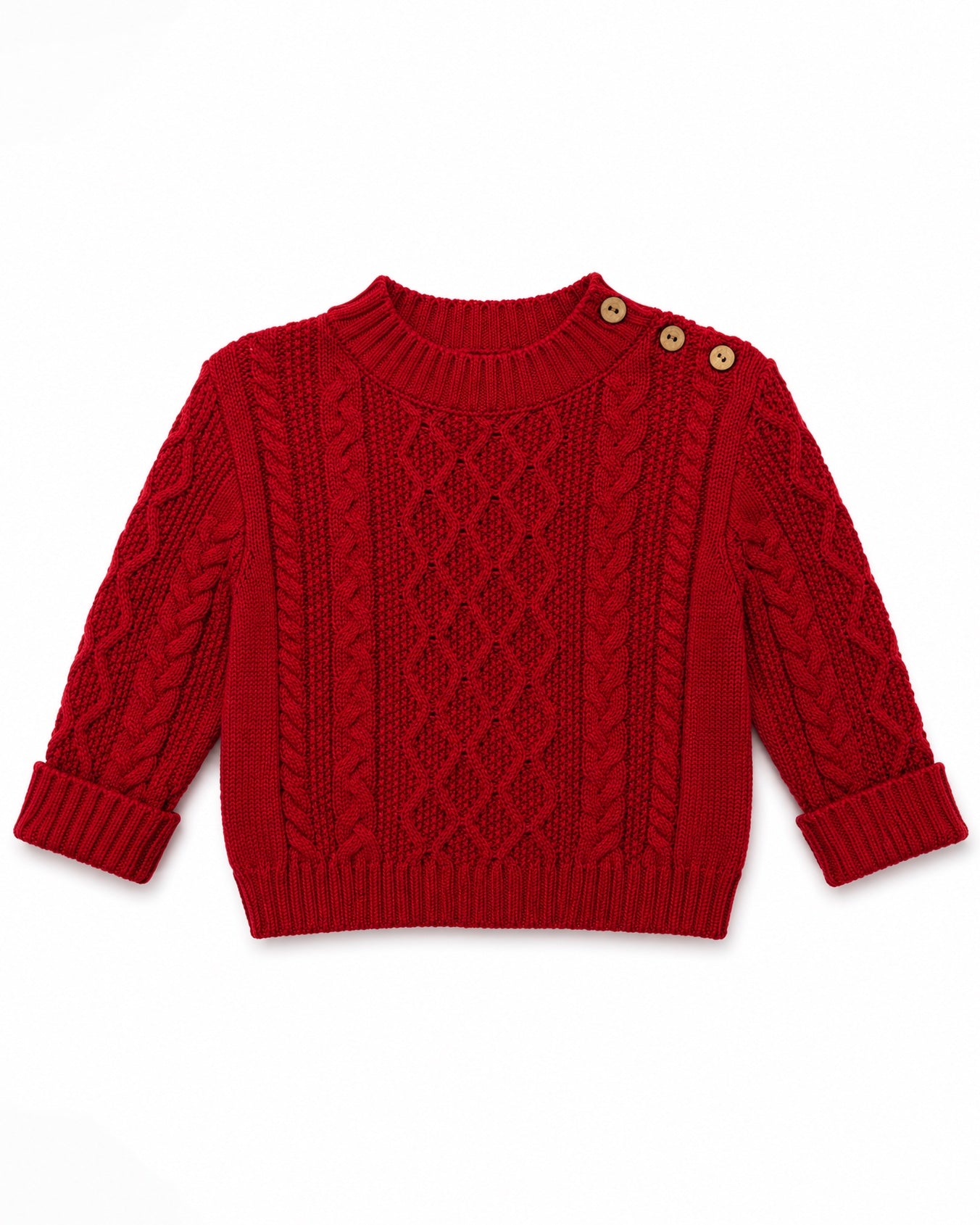 Carriage Boutique red fisherman knit pullover sweater with shoulder button details and textured cable knit pattern.