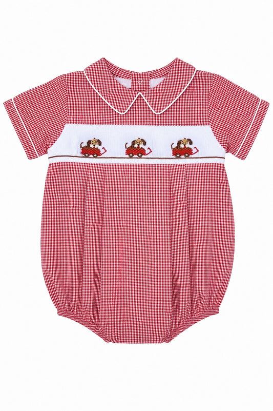 Carriage Boutique red gingham baby bubble romper with smocked bodice featuring dogs in cars, Peter Pan collar, and white piping.