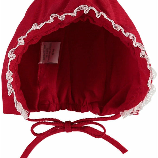 Carriage Boutique red cotton baby bonnet featuring delicate white lace trim and adjustable tie closure