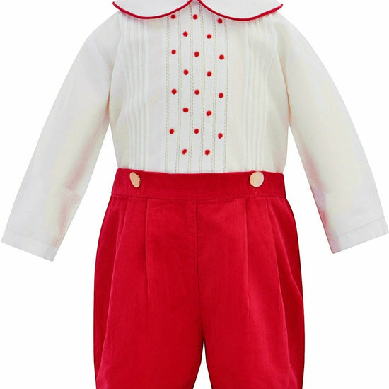 Carriage Boutique red and white cotton bobby suit with a Peter Pan collar, red polka dots, and button-front shorts.