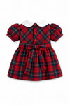 Carriage Boutique red and green plaid baby girl dress with a white Peter Pan collar, puff sleeves, and back bow tie.