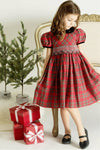 Carriage Boutique toddler girl wearing a red plaid cotton party dress with short sleeves and intricate yoke detail.