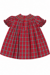 Carriage Boutique red and white plaid cotton baby girl bishop dress with hand smocked chest and short puff sleeves.