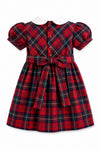 Carriage Boutique toddler girl dress in red and green plaid with a white Peter Pan collar and back bow detail