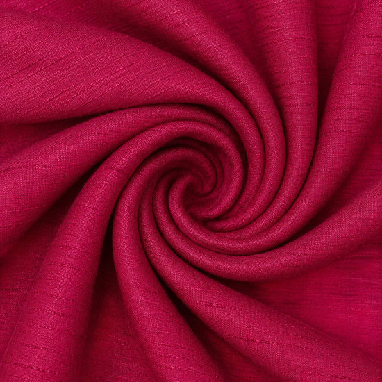Carriage Boutique red poly silk fabric with a subtle textured weave in a swirling pattern