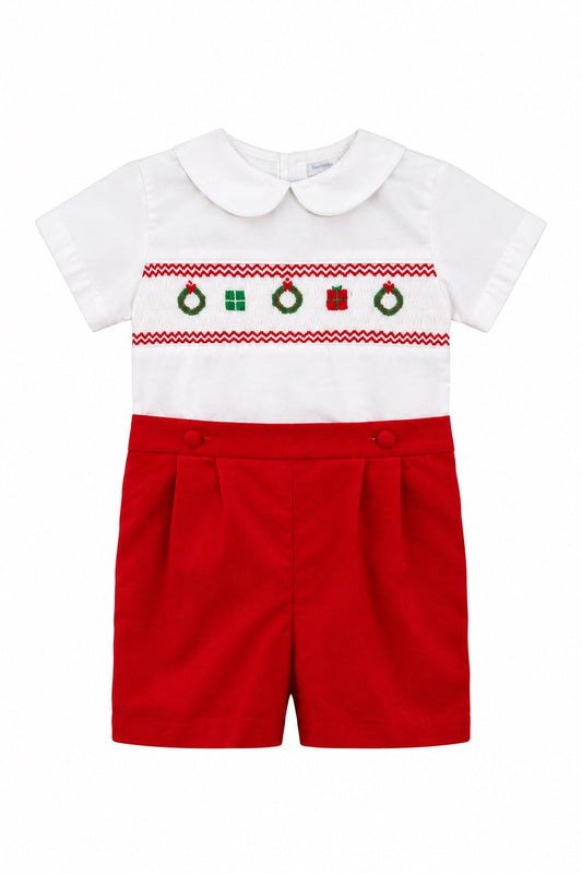 Carriage Boutique red and white cotton bobby suit featuring hand-smocked Christmas motifs and a Peter Pan collar.
