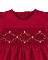 Carriage Boutique red toddler dress featuring a round neck, puffy sleeves, and intricate floral smocked detailing.
