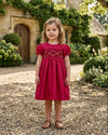 Carriage Boutique toddler girl red silk dress with smocked floral chest detail and puffy short sleeves