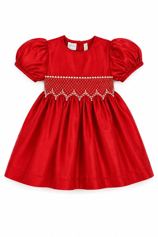 Carriage Boutique red taffeta baby dress with puffed sleeves, smocked diamond detailing, and white bead accents.