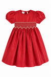Carriage Boutique red taffeta toddler dress with puffed sleeves, smocked diamond detailing, and white bead accents.