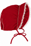 Carriage Boutique red velvet baby bonnet with delicate white lace trim and adjustable tie closure