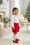 Carriage Boutique red and white cotton bobby suit for toddlers featuring a pleated shirt and red shorts