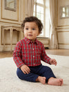 Carriage Boutique baby boy wearing a red and white plaid long sleeve cotton shirt with a classic collar