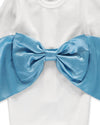 Carriage Boutique white ribbed newborn sleep sack featuring a large, elegant shimmering blue satin decorative bow.