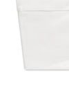 Carriage Boutique white ribbed newborn sleep sack with soft stretch fabric for cozy infant comfort.