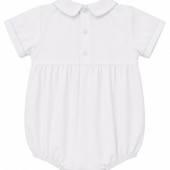 Carriage Boutique white bubble romper with Peter Pan collar, blue piping, and smocked sailboat detail. Short sleeves.