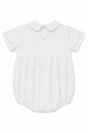 Carriage Boutique white bubble romper with Peter Pan collar, blue piping, and smocked sailboat detail. Short sleeves.