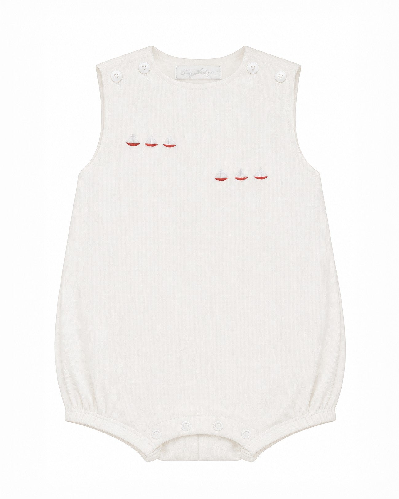 Carriage Boutique white sleeveless bubble with red sailboat embroidery and smocked detailing.
