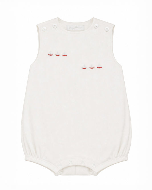 Carriage Boutique white sleeveless bubble with red sailboat embroidery and smocked detailing.
