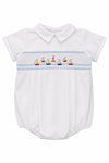 Carriage Boutique white bubble romper with smocked chest featuring sailboats and lighthouse, Peter Pan collar, blue piping.