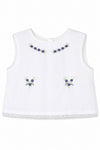 Carriage Boutique sleeveless white cotton baby top with lilac flower bullion embroidery and lace hem detail