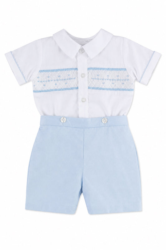 Carriage Boutique infant boy bobby suit with a white smocked shirt and light blue shorts for special occasions.
