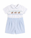 Carriage Boutique baby bobby suit in white and light blue with carousel horse smocking and a peter pan collar.