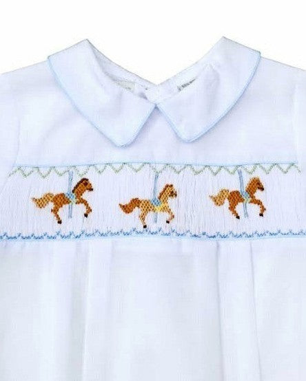 Carriage Boutique white bubble romper with smocked chest featuring carousel horse embroidery and blue piping.