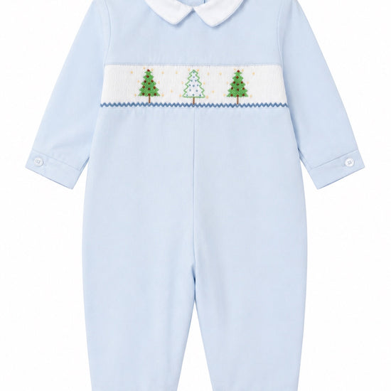Carriage Boutique baby boy longall in light blue cotton with a smocked chest panel featuring Christmas tree embroidery.