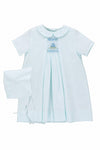 Carriage Boutique baby blue smocked heirloom dress with Peter Pan collar and matching bonnet for special occasions.