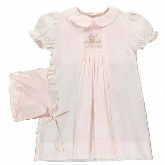 Carriage Boutique pale pink smocked heirloom dress with bird embroidery, Peter Pan collar, and matching ruffled bonnet.