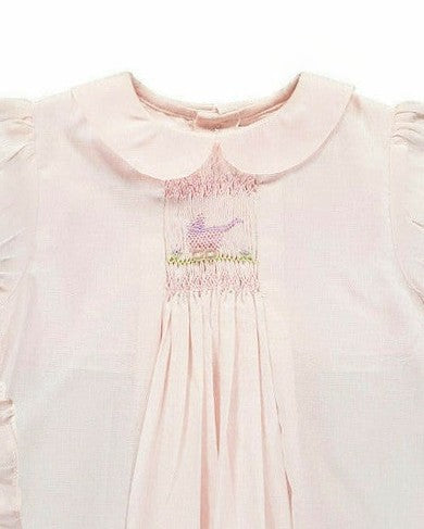 Carriage Boutique pale pink baby dress with hand-smocked bodice, bird embroidery, and classic Peter Pan collar.