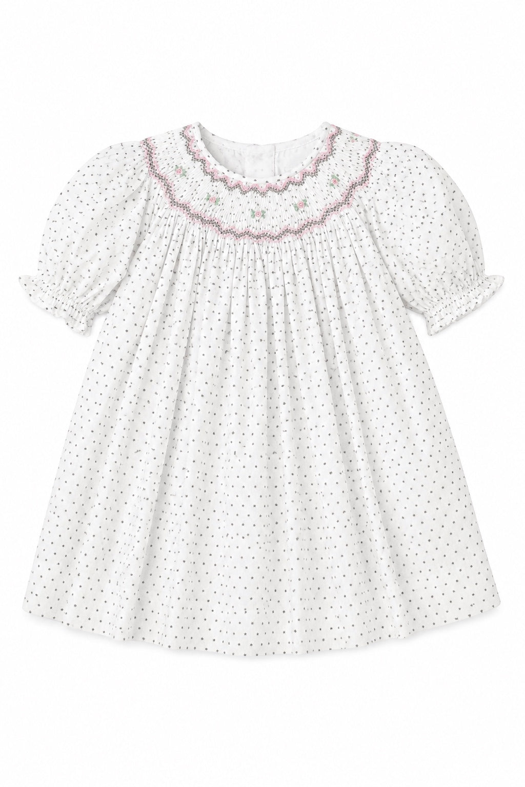 Carriage Boutique baby girl dress in off-white with black polka dots, smocked yoke, and floral embroidery.
