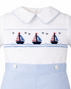 Carriage Boutique white cotton bobby suit with blue trim and smocked sailboat embroidery on the chest