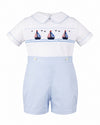 Carriage Boutique smocked bobby suit in white and light blue cotton with a sailboat pattern and peter pan collar.