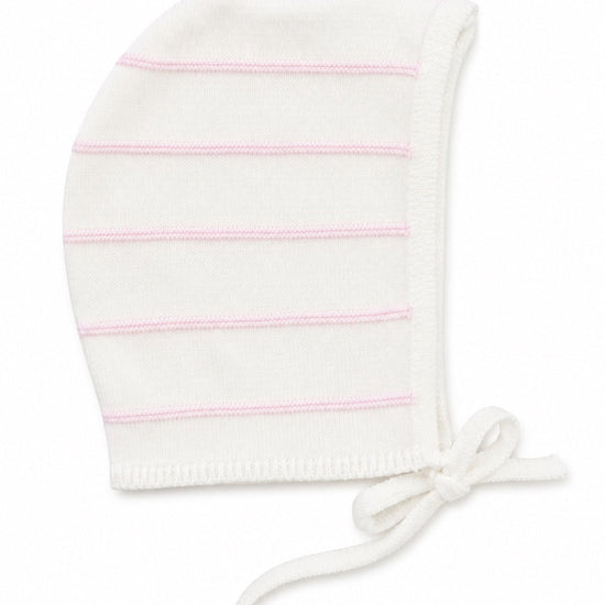 Carriage Boutique newborn baby bonnet in creamy white knit with delicate blush pink stripes and tie closure