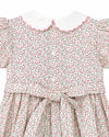 Carriage Boutique tan floral baby girl dress with puff sleeves, white scalloped collar, and back button closure.