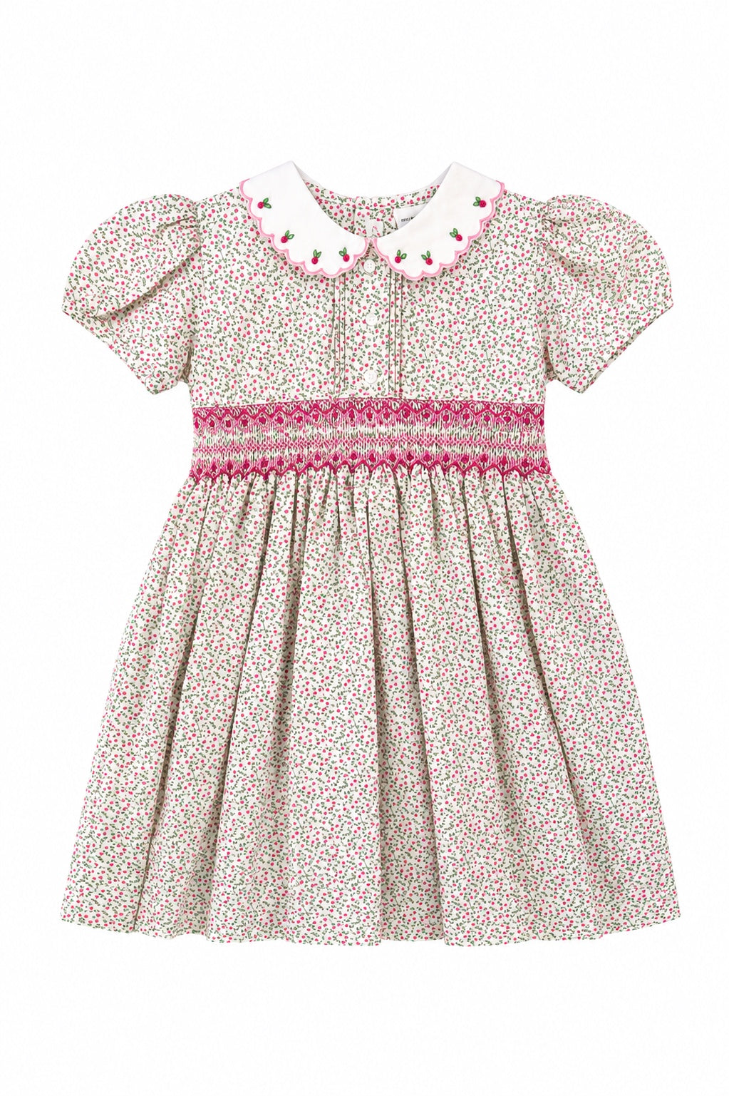 Carriage Boutique toddler girl dress in tan floral cotton with puff sleeves, smocked red diamond detail, and collar.