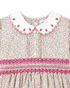 Carriage Boutique tan floral toddler dress with a white scalloped collar, red berry embroidery, and smocked waist.