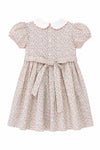 Carriage Boutique toddler girl dress in tan floral cotton with puff sleeves, white scalloped collar, and back buttons.