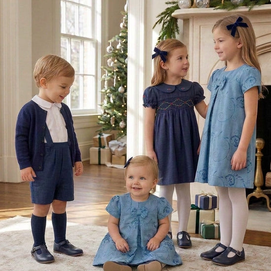 Carriage Boutique toddler and little girl blue suede party dresses with floral patterns and chest ribbon details