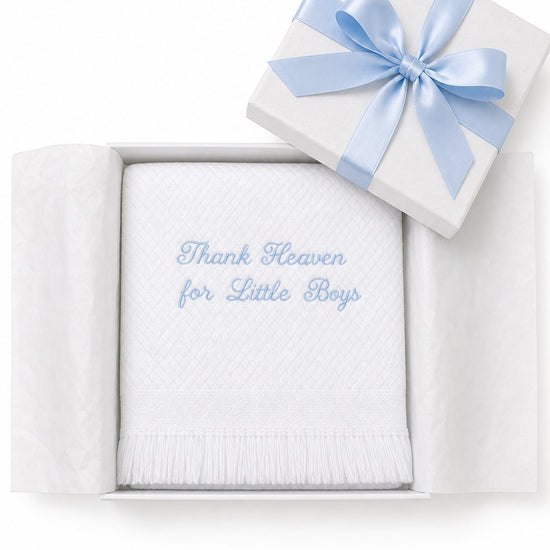 Carriage Boutique white baby blanket with blue Thank Heaven for Little Boys embroidery and fringe in a gift box